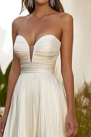 Load image into Gallery viewer, Champagne A Line Strapless Pleated Long Wedding Guest Dress
