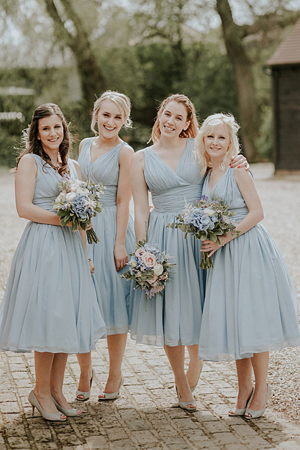 V-neck A Line Blue Chiffon Tea-Length Bridesmaid Dress with Pleated