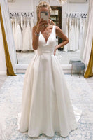 Load image into Gallery viewer, Ivory A-Line Deep V-Neck Long Wedding Dress with Bowknot