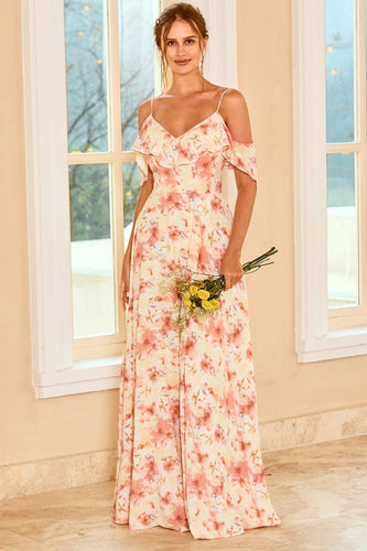 Blush bridesmaid dress printed with ruffles